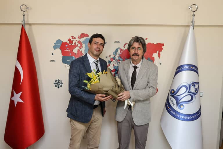 TÜDAM'da bayrak değişimi